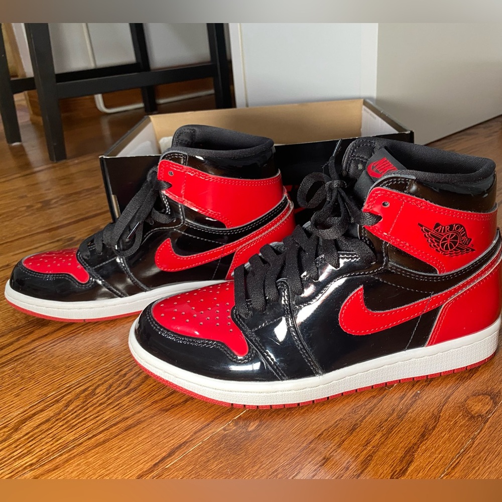 Black and Red Jordans, size: 8.5. Barely used. I have an extra pair of red laces